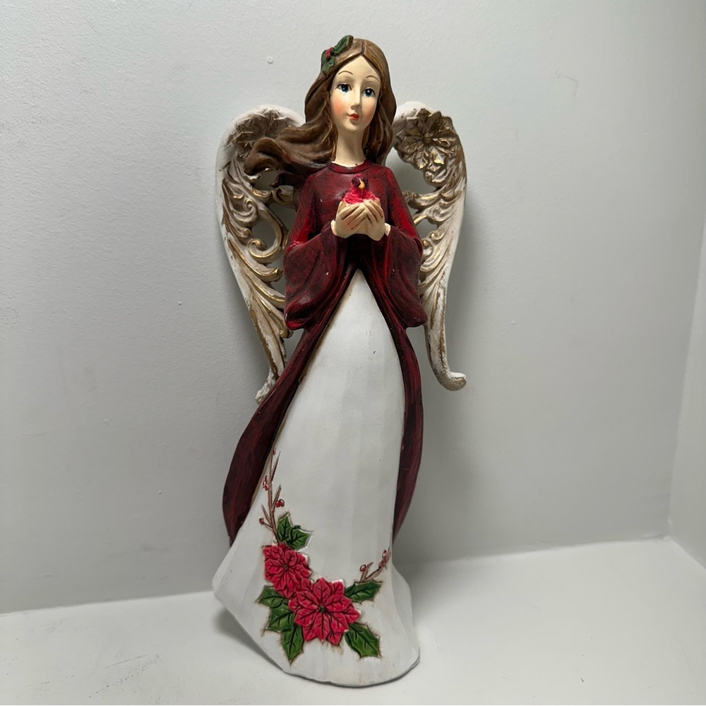 Angel Figure Holding Cardinal Resin